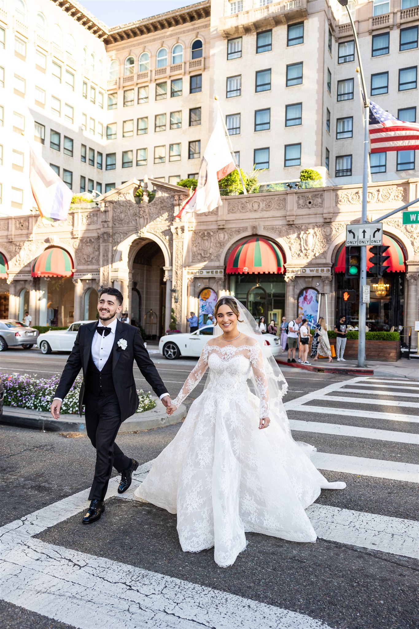 bride and groom in front of the Beverly Wilshire