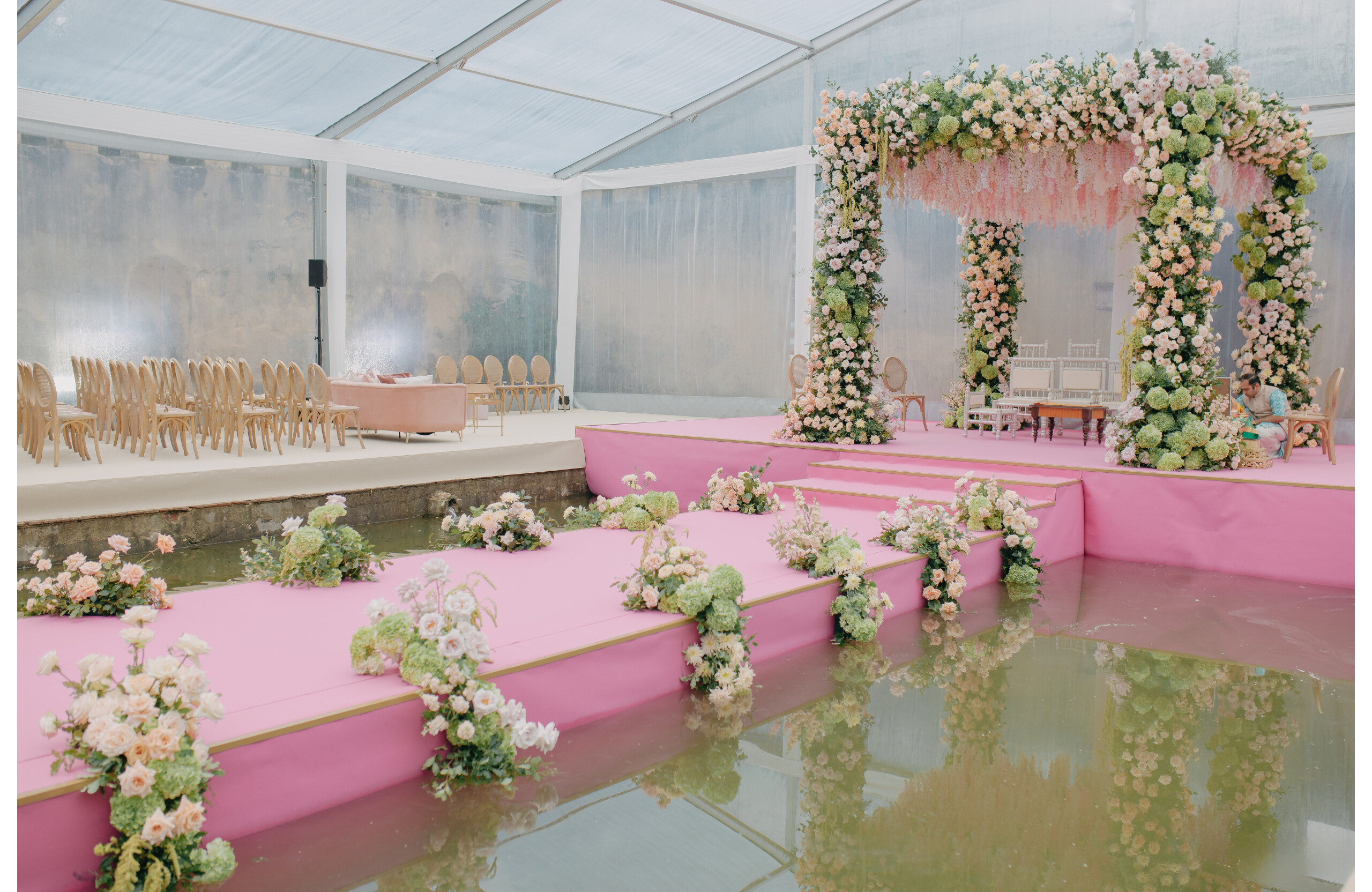 pink wedding ceremony aisle with floral decor