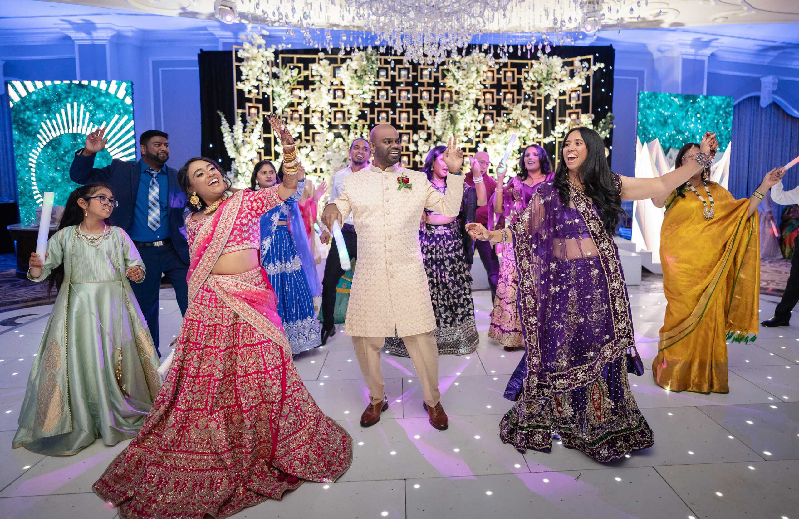 bride and groom dancing with guests